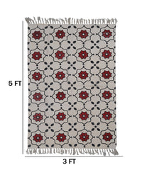Handwoven Beige Cotton Rug with Bold Red Floral Motif and Black Accents – Boho Style Floor Decor