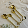 Luxury Gold Spoon Set with Decorative Handles – (Set of 4)