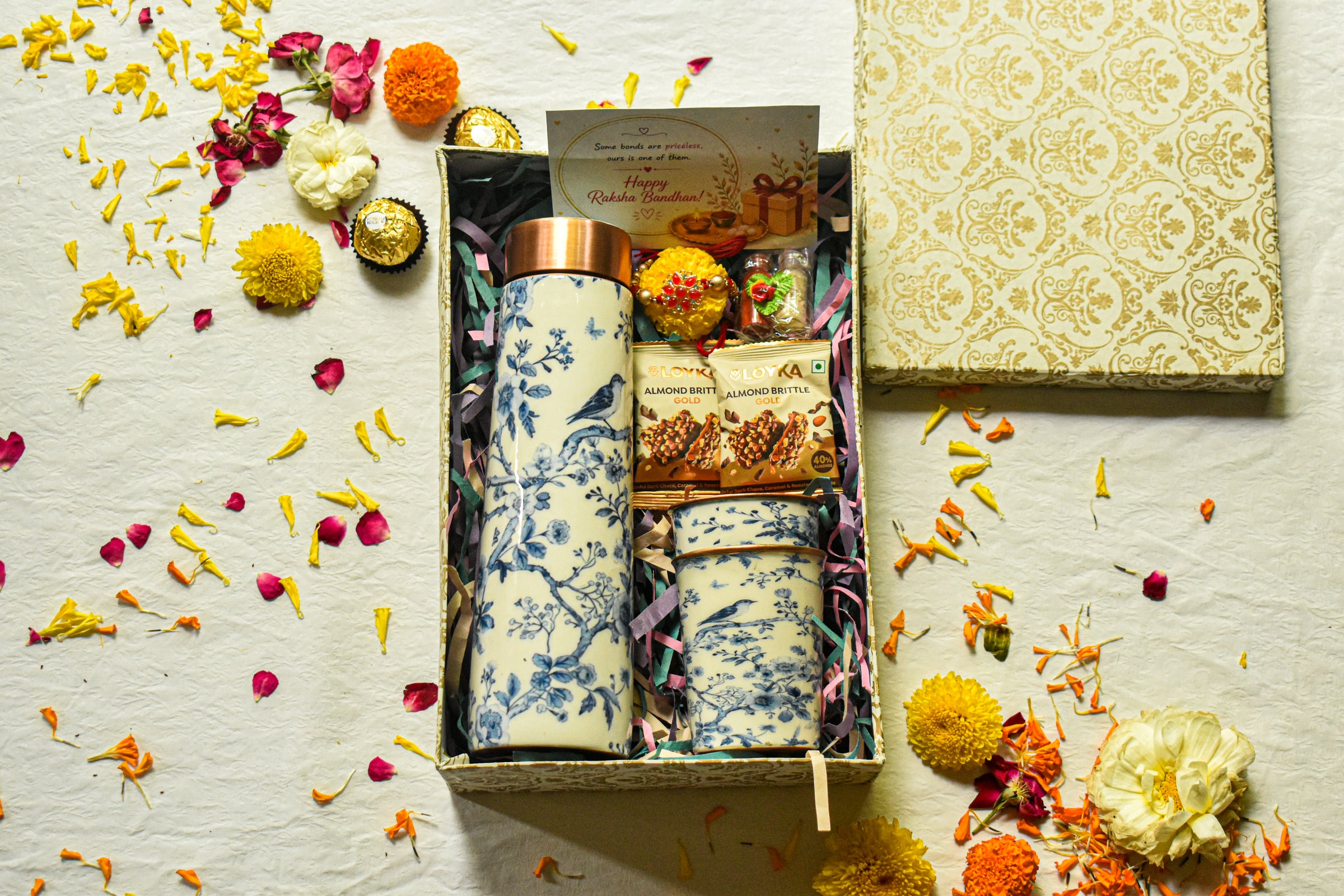 Premium Rakhi Gift Box- Blooming Bird Copper Bottle + 2 Glasses Set
