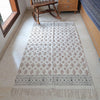 Tribal Earth Handwoven Rug – Natural Cotton with Geometric Border