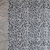 Monochrome Leaf Handwoven Cotton Rug – Black & Ivory with Fringe