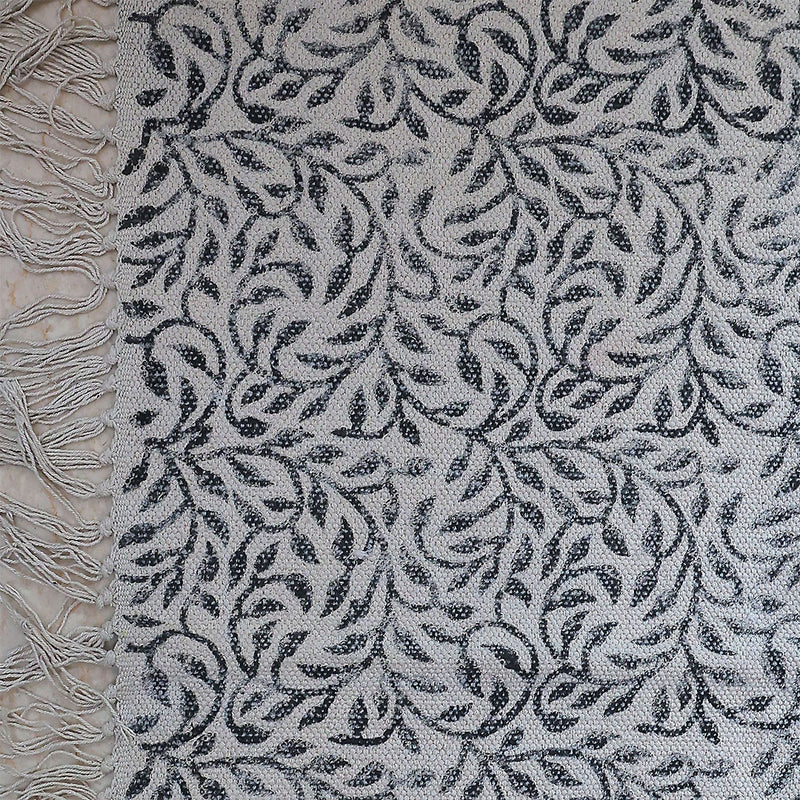 Monochrome Leaf Handwoven Cotton Rug – Black & Ivory with Fringe