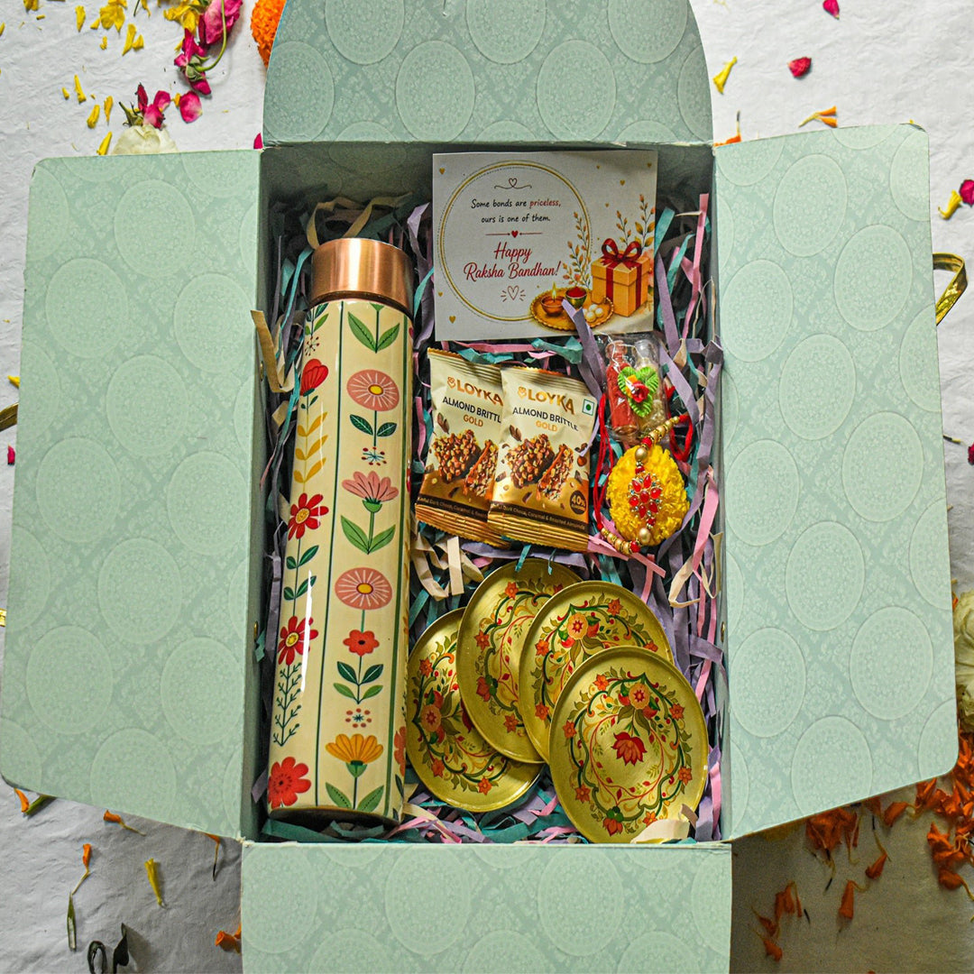 Premium Rakhi Gift Box- Phoolkari Copper Bottle +Brass Coaster Floral Set Of 4